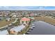 Drone view of building, showcasing water access and neighborhood at 1340 Rock Dove Ct # 135, Punta Gorda, FL 33950