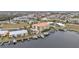 Bird's-eye view highlighting building, docks, and surrounding area at 1340 Rock Dove Ct # 135, Punta Gorda, FL 33950