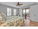 King sized bedroom with private balcony and ceiling fan at 1340 Rock Dove Ct # 135, Punta Gorda, FL 33950