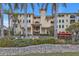 Building exterior showcasing architectural details and landscaping at 1340 Rock Dove Ct # 135, Punta Gorda, FL 33950