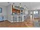 Kitchen with island, wooden cabinets, and tile flooring at 1340 Rock Dove Ct # 135, Punta Gorda, FL 33950