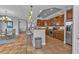 Open kitchen boasting stainless steel appliances and wood cabinets at 1340 Rock Dove Ct # 135, Punta Gorda, FL 33950