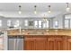 Granite countertop kitchen with stainless steel appliances and sink at 1340 Rock Dove Ct # 135, Punta Gorda, FL 33950