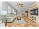Spacious living room with hardwood floors and access to balcony at 1340 Rock Dove Ct # 135, Punta Gorda, FL 33950