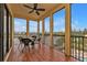 Relaxing screened balcony overlooking the waterway with seating for four at 1340 Rock Dove Ct # 135, Punta Gorda, FL 33950