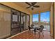 Private screened balcony features outdoor seating and waterway views at 1340 Rock Dove Ct # 135, Punta Gorda, FL 33950