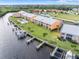 Aerial view of waterfront condos, pool and private boat docks at 1348 Rock Dove Ct # C103, Punta Gorda, FL 33950