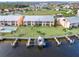 Aerial view of condo building with private boat dock at 1348 Rock Dove Ct # C103, Punta Gorda, FL 33950