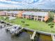 Aerial view of waterfront community with boat docks and pool at 1348 Rock Dove Ct # C103, Punta Gorda, FL 33950