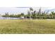Private boat dock with lift and lush green lawn at 1348 Rock Dove Ct # C103, Punta Gorda, FL 33950