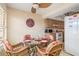 Cozy dining area with wicker chairs and glass table at 1348 Rock Dove Ct # C103, Punta Gorda, FL 33950