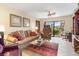 Condo living room with comfortable seating and large TV at 1348 Rock Dove Ct # C103, Punta Gorda, FL 33950