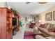 Living room with open concept view to kitchen and dining area at 1348 Rock Dove Ct # C103, Punta Gorda, FL 33950