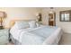 Spacious main bedroom with large window and ensuite bathroom at 1348 Rock Dove Ct # C103, Punta Gorda, FL 33950