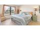 Spacious main bedroom with large window and sitting area at 1348 Rock Dove Ct # C103, Punta Gorda, FL 33950