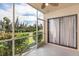 Screened porch with water view and sliding doors at 1348 Rock Dove Ct # C103, Punta Gorda, FL 33950