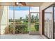 Screened-in porch overlooking a canal at 1348 Rock Dove Ct # C103, Punta Gorda, FL 33950