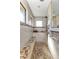 Spa-like bathroom with walk-in shower, granite seat, and large windows at 143 Uruguay Dr, Punta Gorda, FL 33983