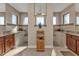 Spa-like bathroom with walk-in shower, double vanity, and granite countertops at 143 Uruguay Dr, Punta Gorda, FL 33983