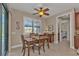Breakfast nook with table and chairs, access to hallway and kitchen at 143 Uruguay Dr, Punta Gorda, FL 33983
