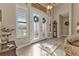 Elegant entryway with double doors and tile flooring at 143 Uruguay Dr, Punta Gorda, FL 33983