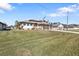 House with a large yard, showcasing curb appeal at 143 Uruguay Dr, Punta Gorda, FL 33983