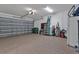 Spacious garage with ample storage and epoxy flooring at 143 Uruguay Dr, Punta Gorda, FL 33983