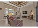 Bright and airy living area with a coffered ceiling at 143 Uruguay Dr, Punta Gorda, FL 33983