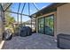 Screened patio with built-in grill and storage at 143 Uruguay Dr, Punta Gorda, FL 33983