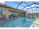 Large, inviting pool with a screened patio at 143 Uruguay Dr, Punta Gorda, FL 33983