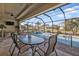 Relaxing screened pool area with patio furniture at 143 Uruguay Dr, Punta Gorda, FL 33983