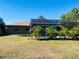 Large backyard with a screened pool area at 1434 Viscaya Dr, Port Charlotte, FL 33952