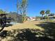 Spacious backyard, screened pool, shed, and trees at 1434 Viscaya Dr, Port Charlotte, FL 33952