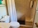 Bathroom features a shower stall and toilet at 1434 Viscaya Dr, Port Charlotte, FL 33952