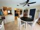 Dining area with a view into living room and kitchen at 1434 Viscaya Dr, Port Charlotte, FL 33952