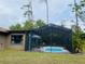 Spacious screened pool with a large backyard at 1434 Viscaya Dr, Port Charlotte, FL 33952