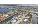 Aerial view showing waterfront property and neighborhood at 162 Croop Se Ln, Port Charlotte, FL 33952