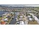 Aerial view of canal-front homes and community at 162 Croop Se Ln, Port Charlotte, FL 33952
