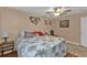 Spacious bedroom with a king-size bed and tropical decor at 162 Croop Se Ln, Port Charlotte, FL 33952