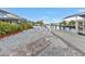 Brick pathway leads to a private boat dock at 162 Croop Se Ln, Port Charlotte, FL 33952