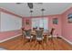 Coastal-themed dining room with round table and rattan chairs at 162 Croop Se Ln, Port Charlotte, FL 33952