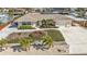 Single-story home with landscaped yard and attached garage at 162 Croop Se Ln, Port Charlotte, FL 33952