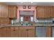 Spacious kitchen with granite countertops and stainless steel appliances at 162 Croop Se Ln, Port Charlotte, FL 33952