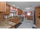 Modern kitchen featuring granite countertops and stainless steel appliances at 162 Croop Se Ln, Port Charlotte, FL 33952
