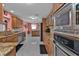 Bright kitchen with granite countertops and stainless steel appliances at 162 Croop Se Ln, Port Charlotte, FL 33952