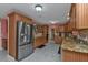 Modern kitchen with stainless steel appliances and ample cabinetry at 162 Croop Se Ln, Port Charlotte, FL 33952