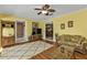 Spacious living area with hardwood floors and built-in shelving at 162 Croop Se Ln, Port Charlotte, FL 33952