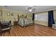 Bright bedroom with a king-size bed and a home office at 162 Croop Se Ln, Port Charlotte, FL 33952
