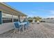 Outdoor dining area on a brick patio with seating at 162 Croop Se Ln, Port Charlotte, FL 33952
