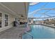 Resort-style pool area with covered patio and outdoor seating at 162 Croop Se Ln, Port Charlotte, FL 33952